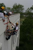  John Gerring as the attendant on the horizontal lower